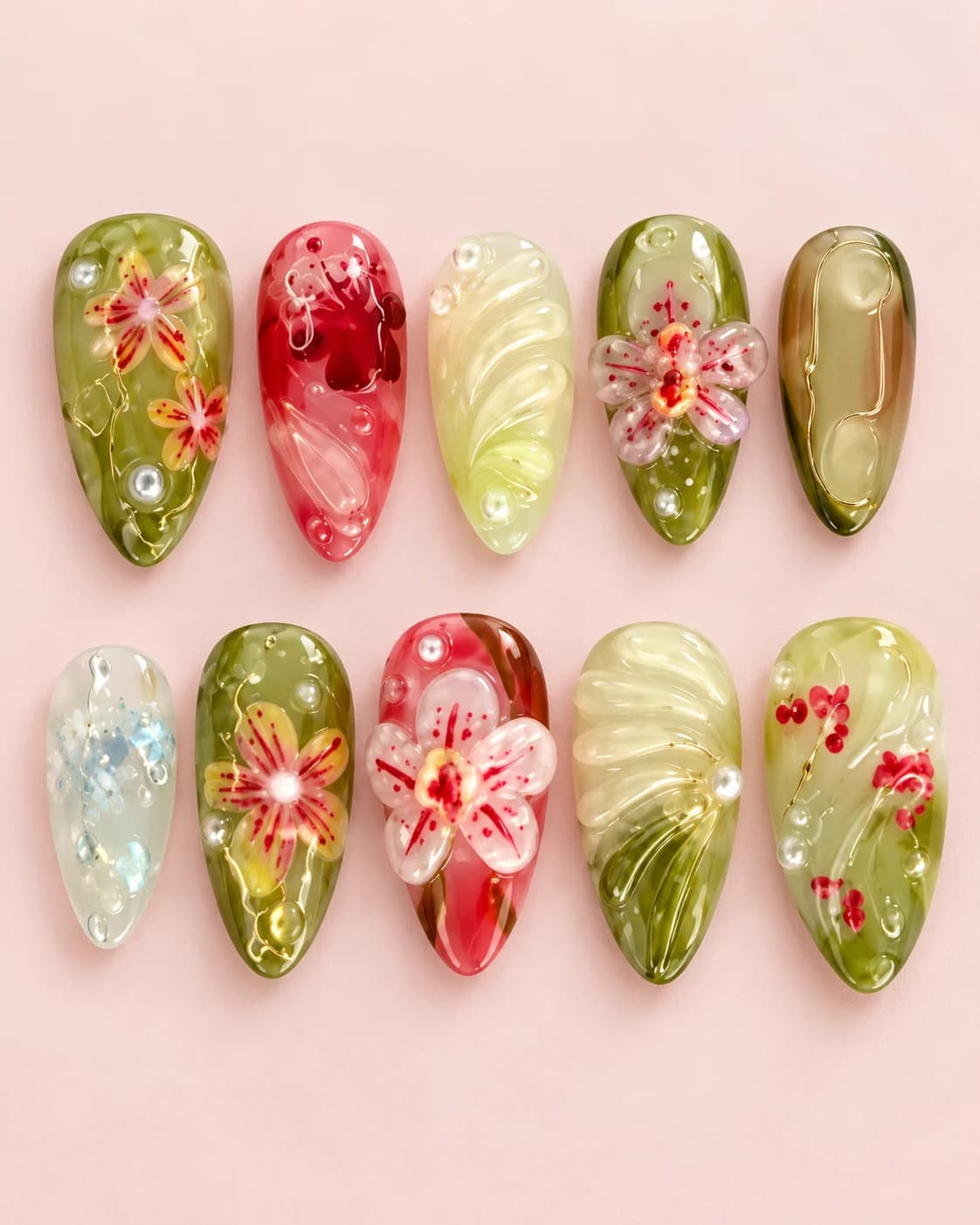 Matcha Blossom: muestra de diez uñas sobre fondo rosa
